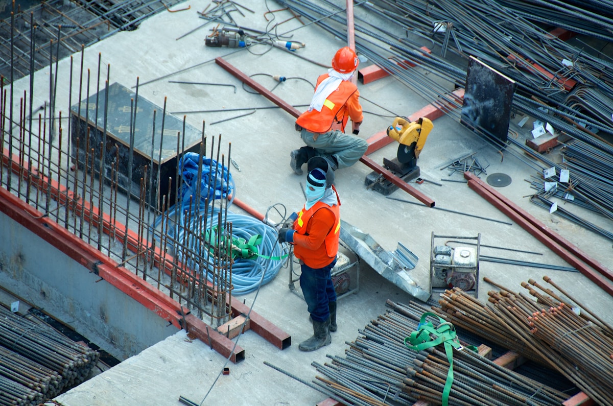 Industrial facility workers performing maintenance